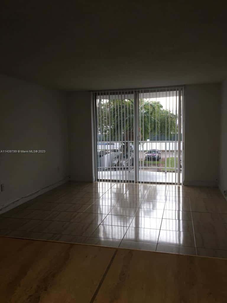 498 NW 165th St Rd # D205, Miami FL 33169