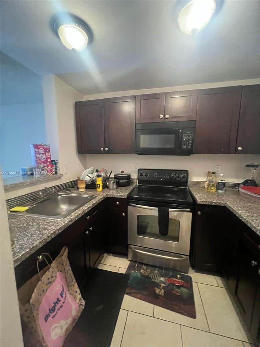 482 NW 165th St Rd # A203, Miami FL 33169