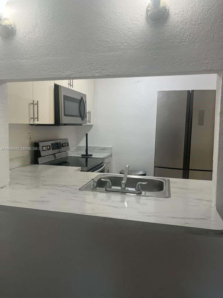 4550 NW 9th St # 114E, Miami FL 33126