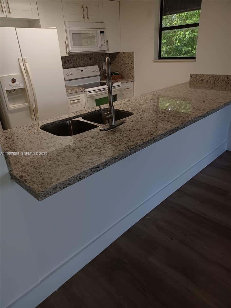 16220 NW 2nd Ave # 411, Miami FL 33169