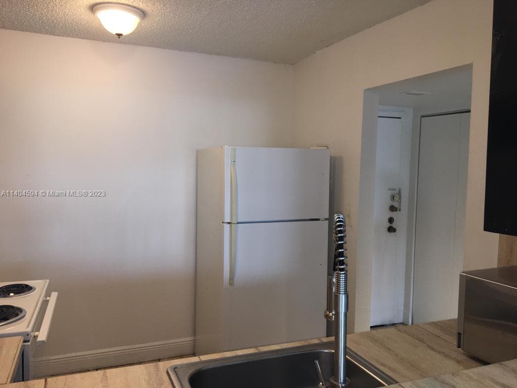 496 NW 165th St Rd # D312, Miami FL 33169 — 9