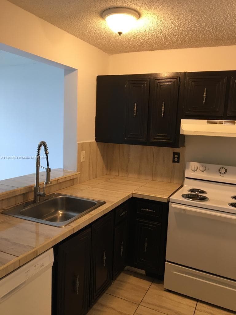 496 NW 165th St Rd # D312, Miami FL 33169 — 10