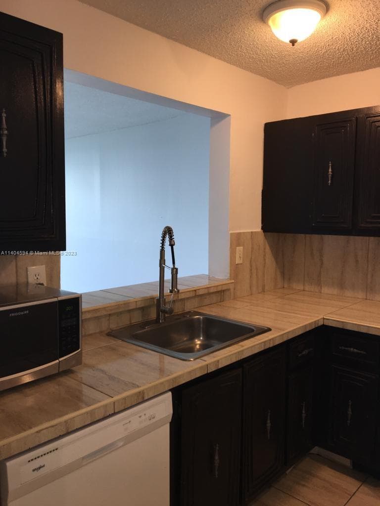 496 NW 165th St Rd # D312, Miami FL 33169 — 11