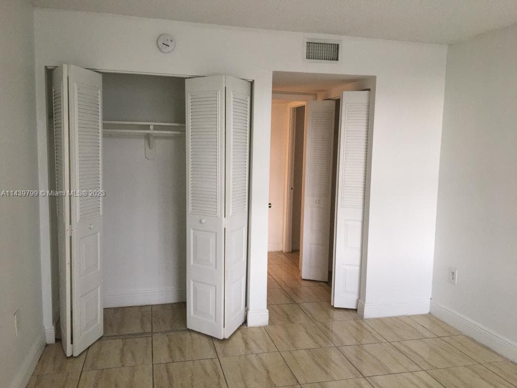 498 NW 165th St Rd # D205, Miami FL 33169 — 9