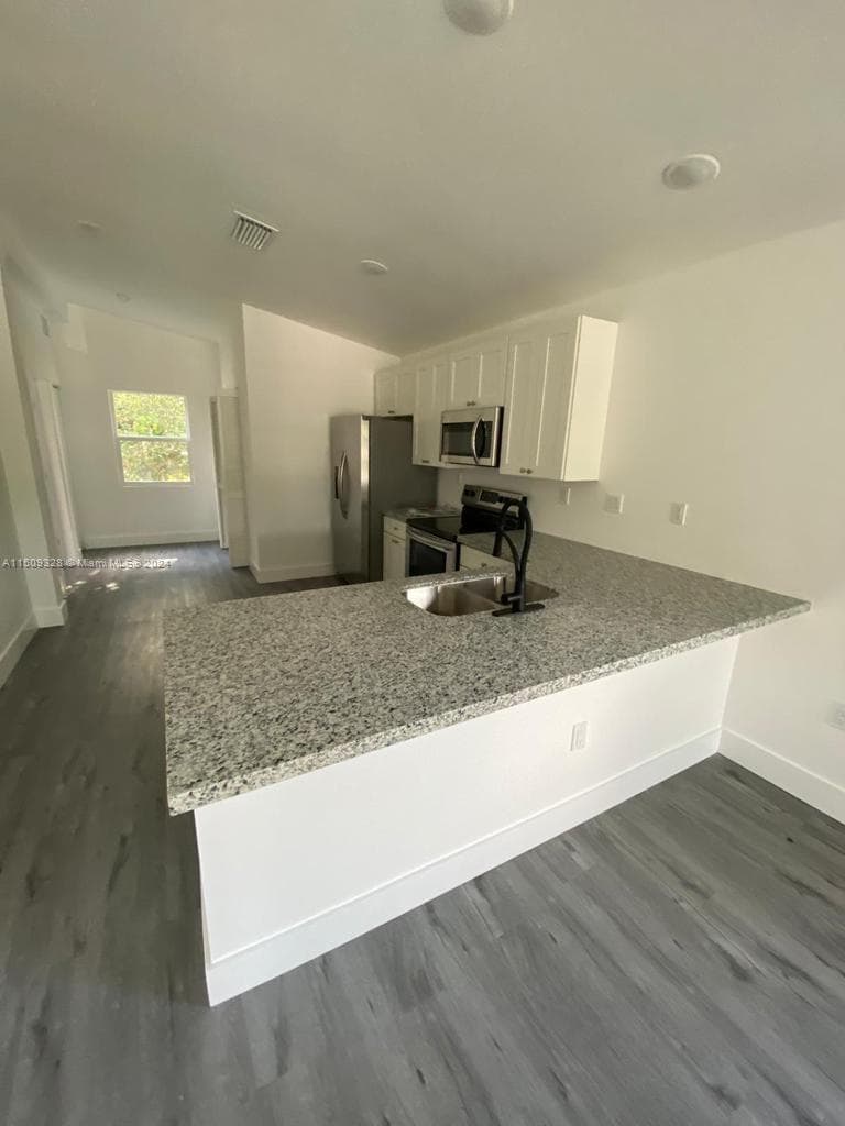 190 NW 57th St, Miami FL 33127 — 9