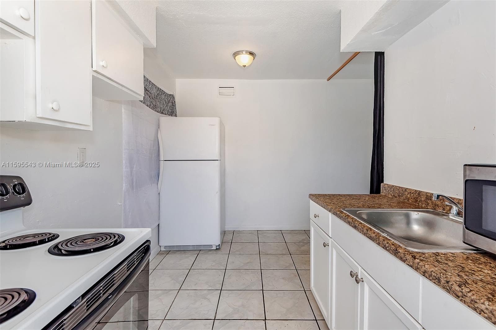 5600 NW 7th Ct # 14, Miami FL 33127 — 3