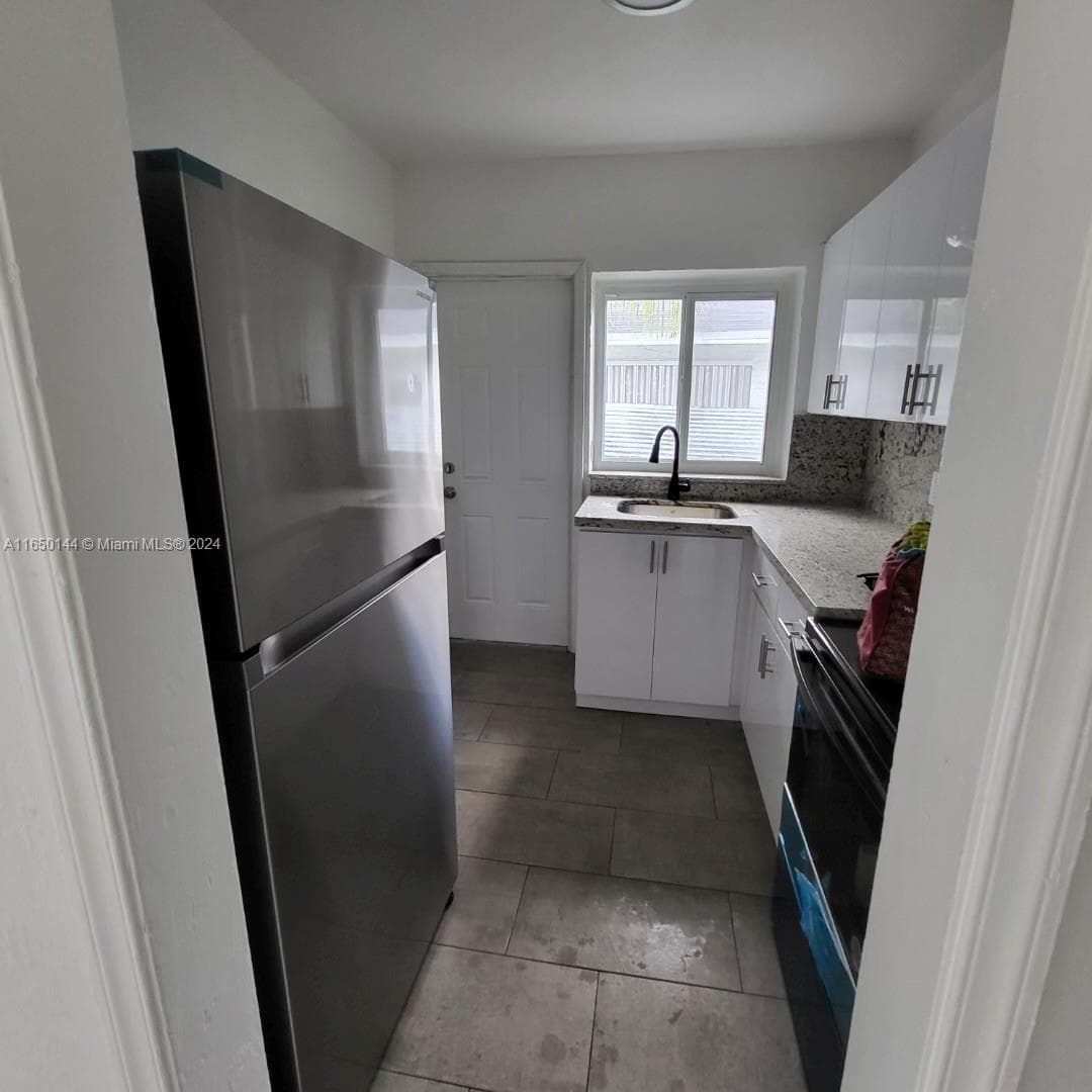7710 NE 1st Ct, Miami FL 33138 — 26
