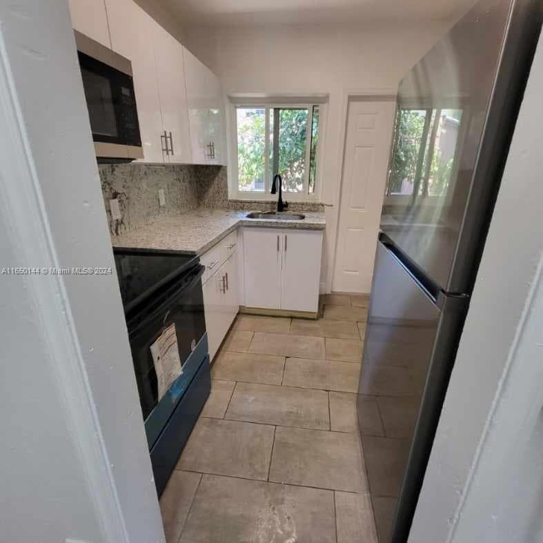 7710 NE 1st Ct, Miami FL 33138 — 20