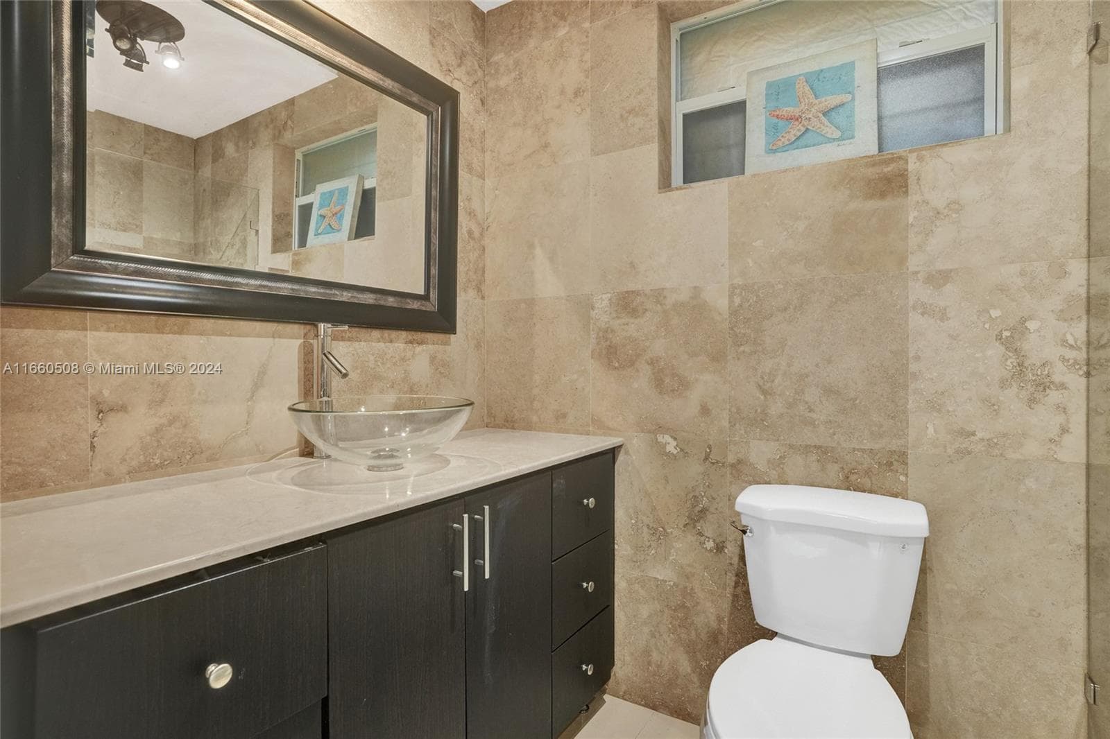 1910 N Hibiscus Dr, North Miami FL 33181 — 26
