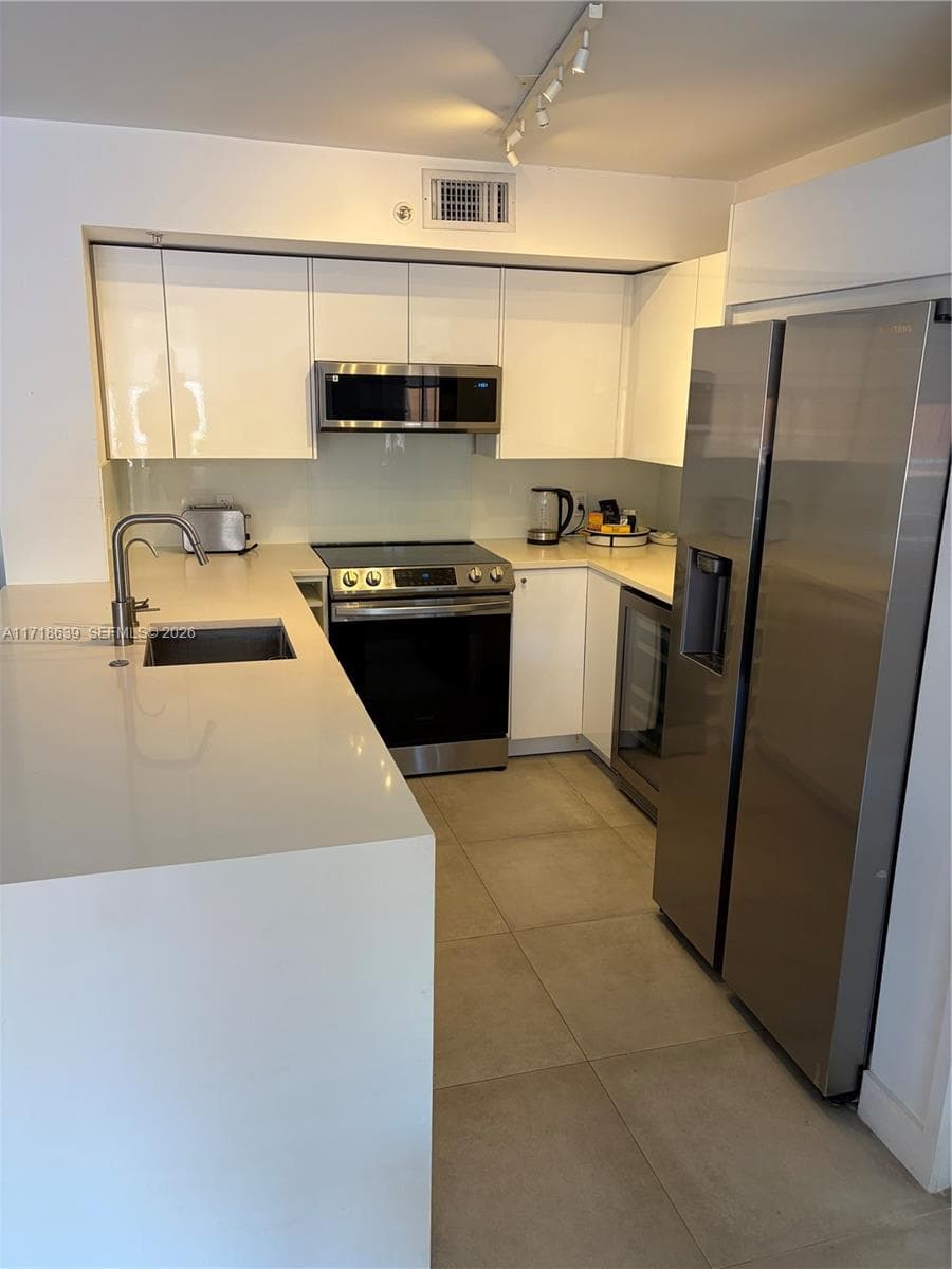 90 Alton Rd # 303, Miami Beach FL 33139 — 5