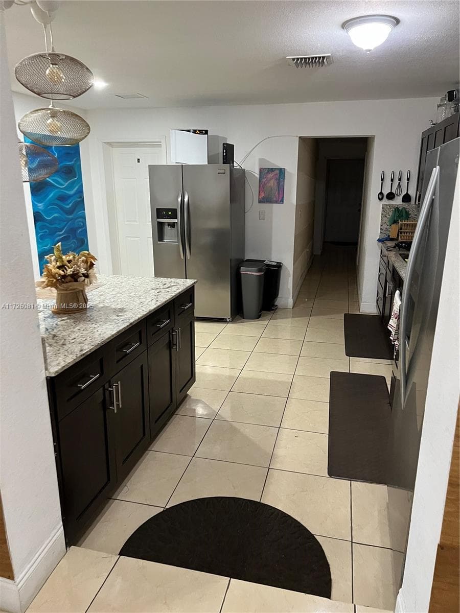 720 NW 30th Ave, Miami FL 33125 — 12