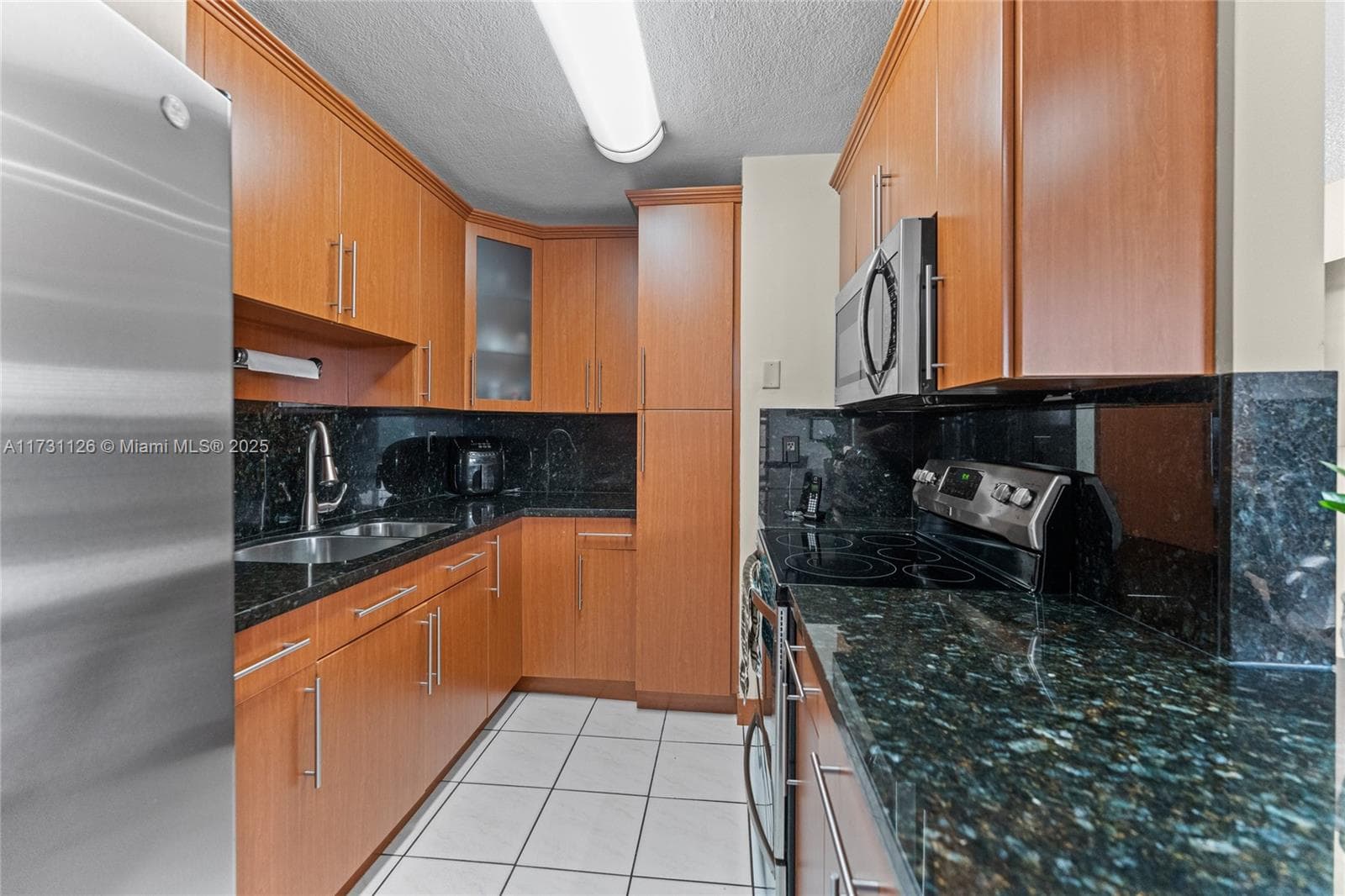 605 NW 72nd Ave # 406, Miami FL 33126 — 15