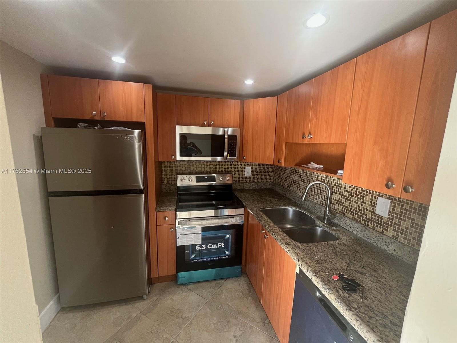 498 NW 165th St # 501, Miami FL 33169 — 3