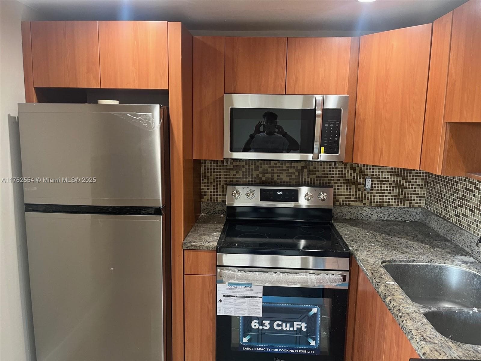 498 NW 165th St # 501, Miami FL 33169 — 8