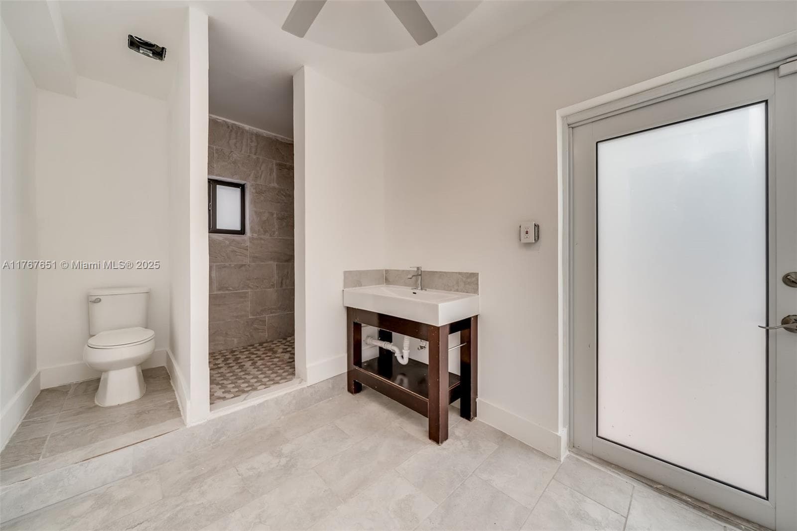 247 NW 54th St, Miami FL 33127 — 24