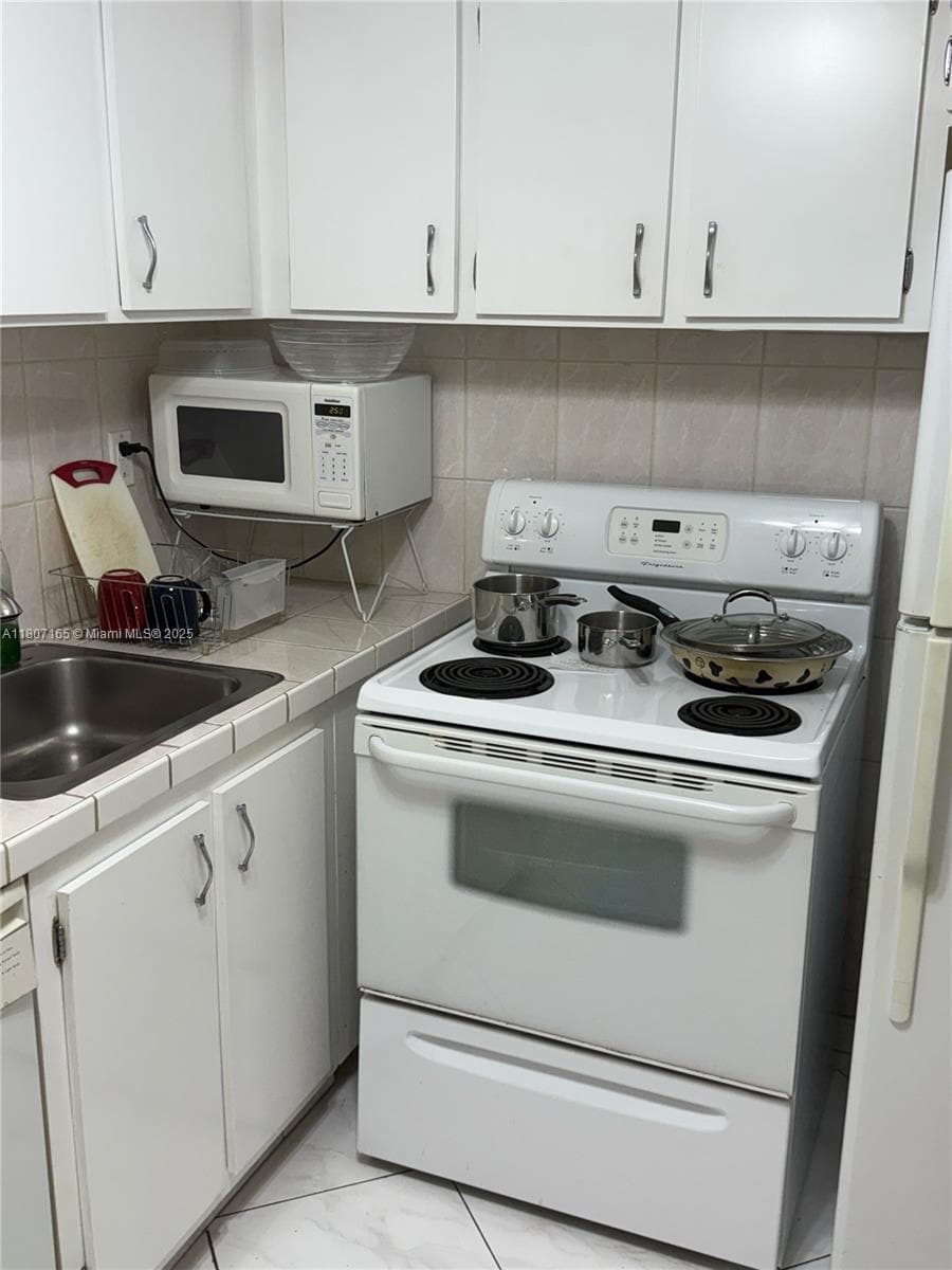 1395 NE 167th St # 203, Miami FL 33162 — 6