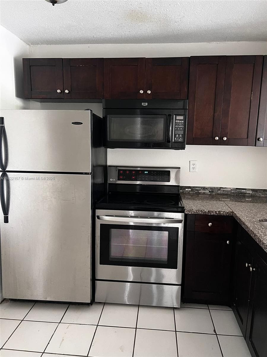 498 NW 165th St Rd # D303, Miami FL 33169 — 1