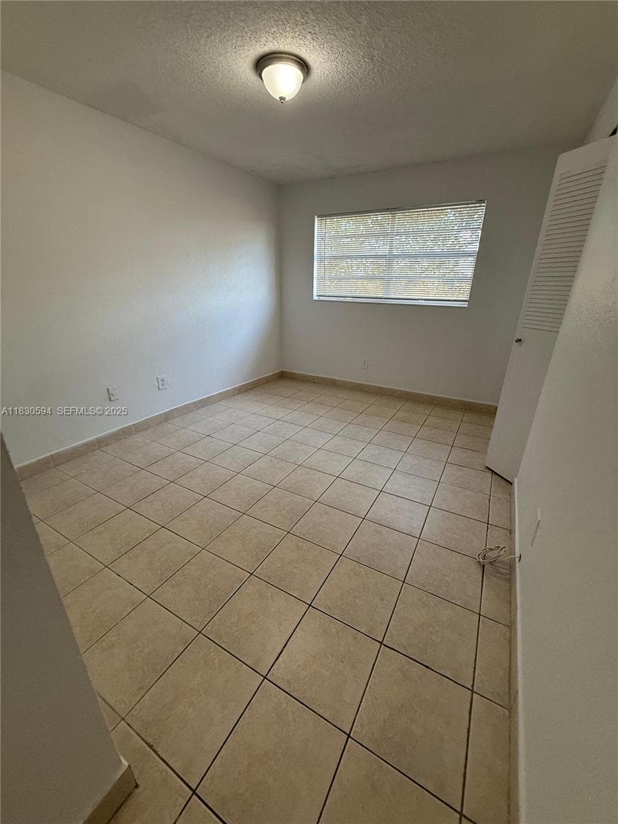 1305 W 53rd St # 406, Hialeah FL 33012 — 23