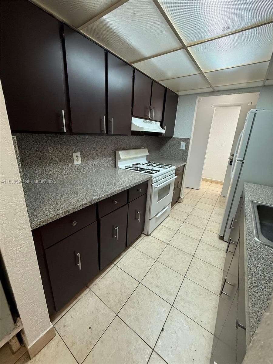 1305 W 53rd St # 406, Hialeah FL 33012 — 3