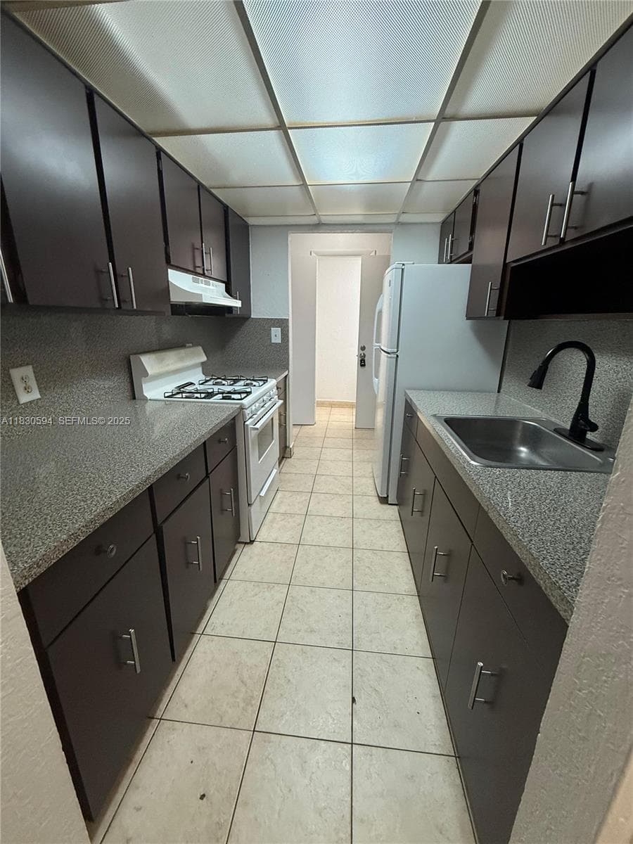1305 W 53rd St # 406, Hialeah FL 33012 — 4