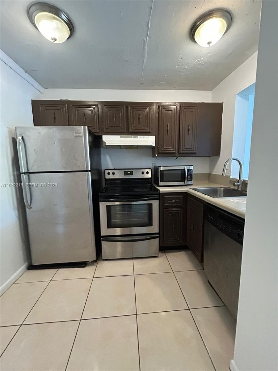 496 NW 165th St Rd # 310, Miami FL 33169 — 2
