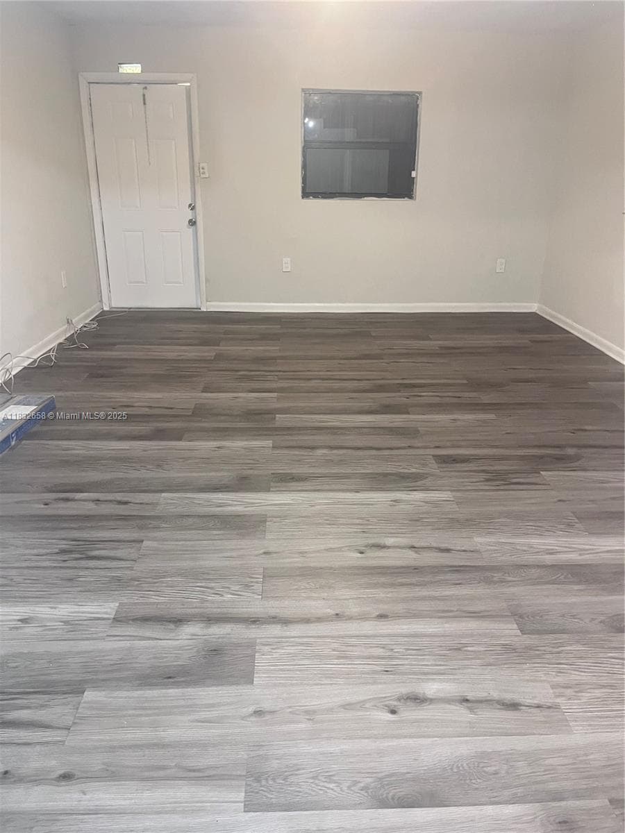 1927 NW 64 st, Miami FL 33147 — 3