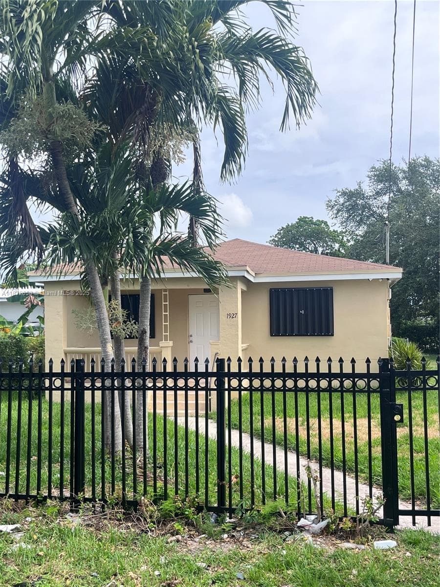 1927 NW 64 st, Miami FL 33147 — 1