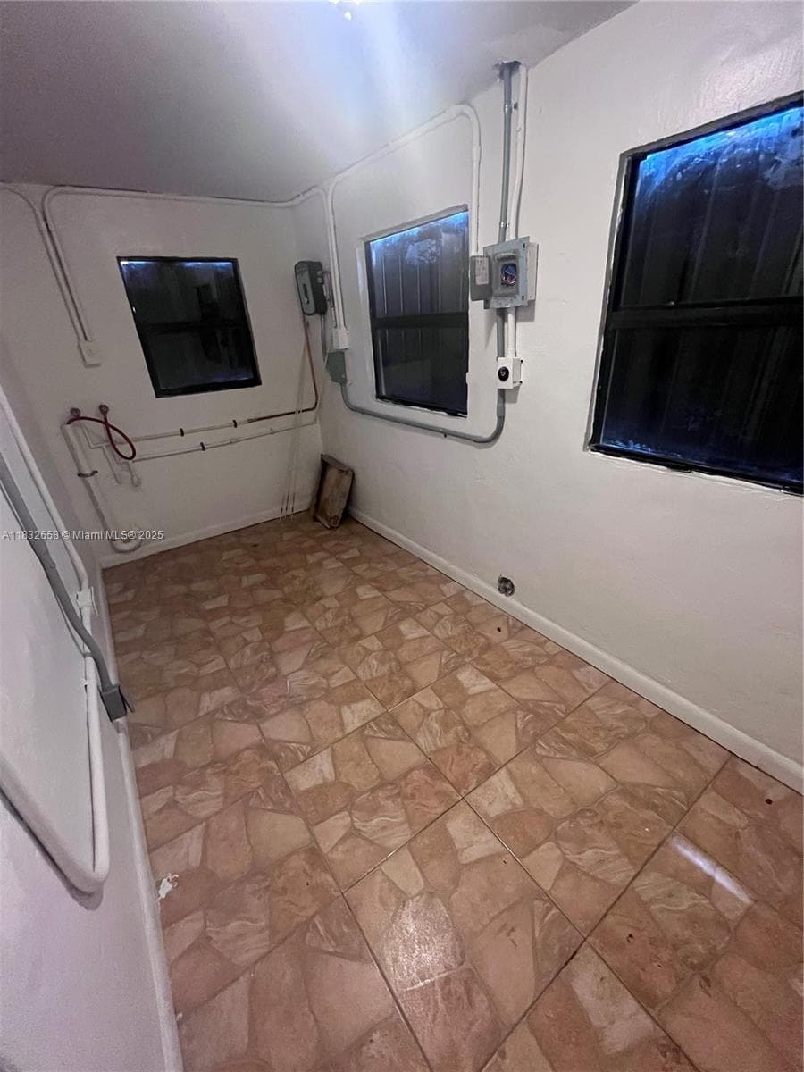 1927 NW 64 st, Miami FL 33147 — 9