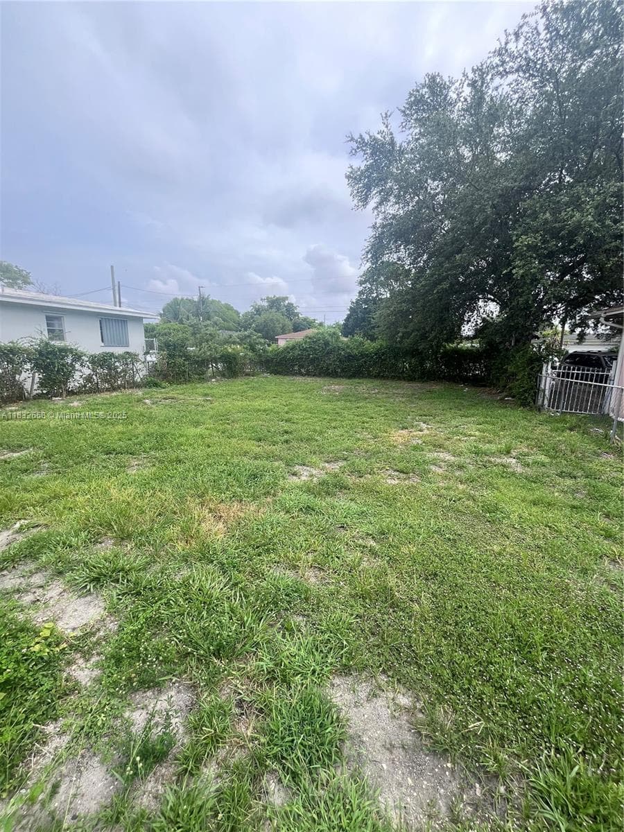 1927 NW 64 st, Miami FL 33147 — 10
