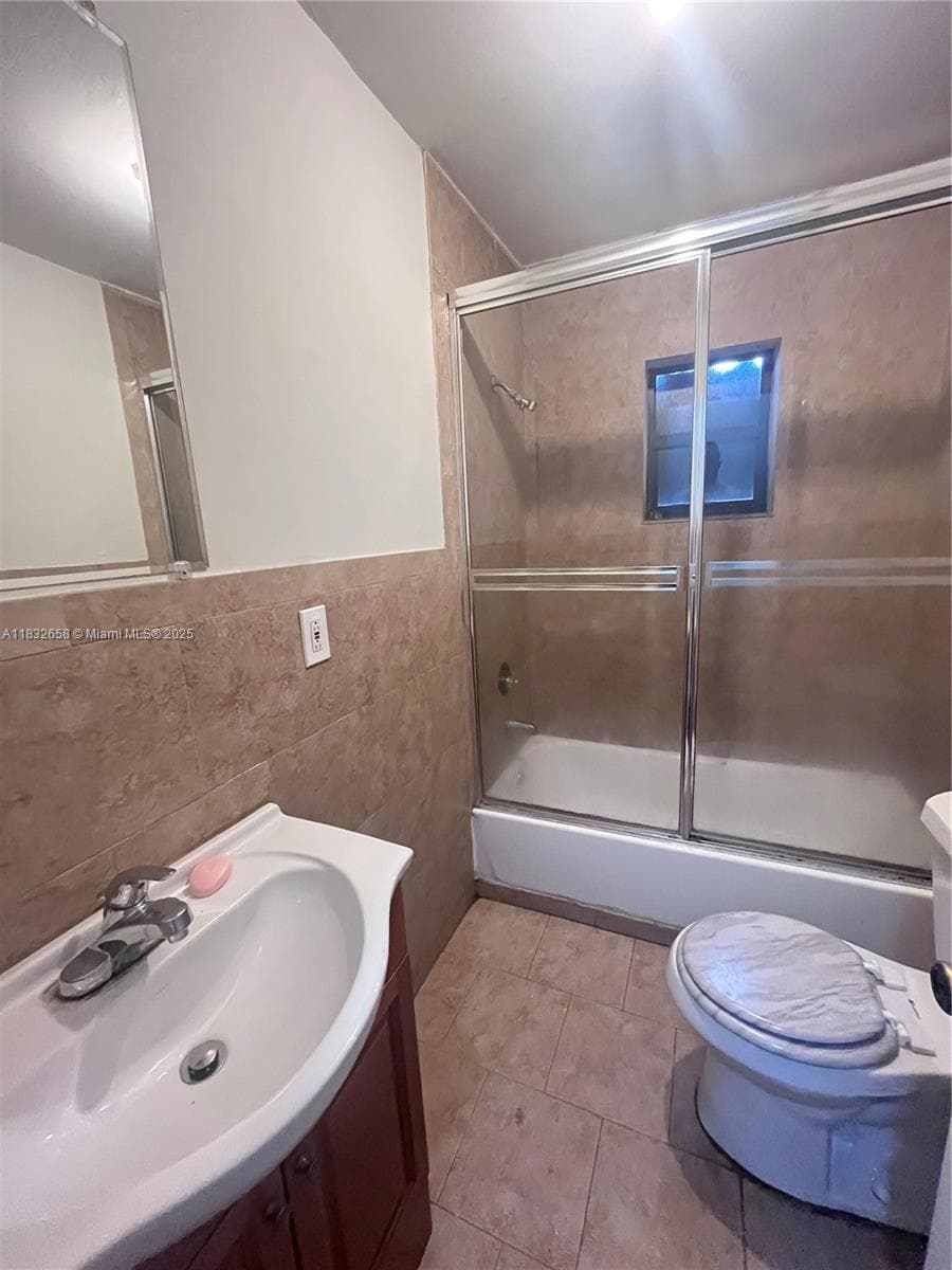 1927 NW 64 st, Miami FL 33147 — 8