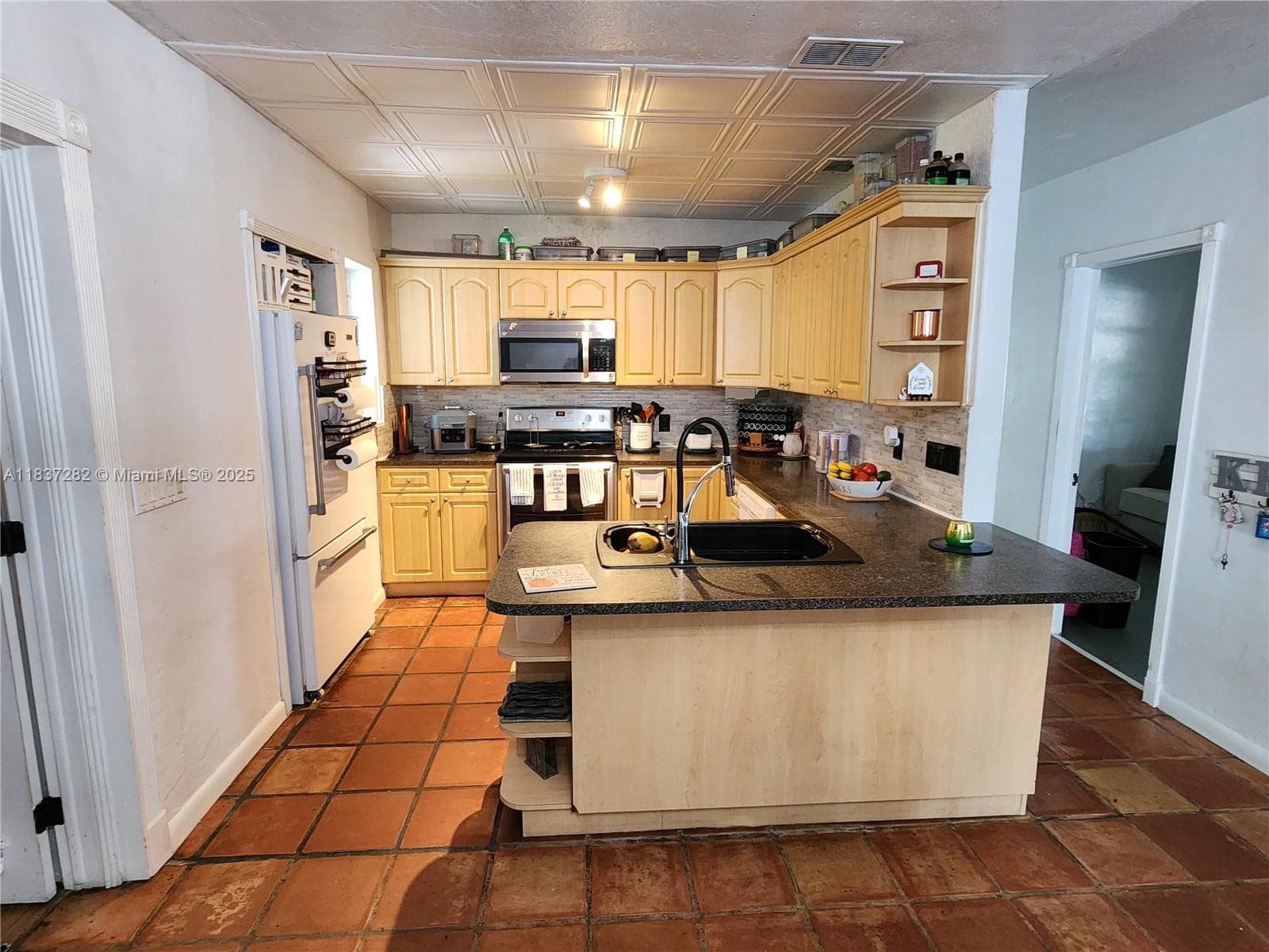 3521 E 8th Ave, Hialeah FL 33013 — 25