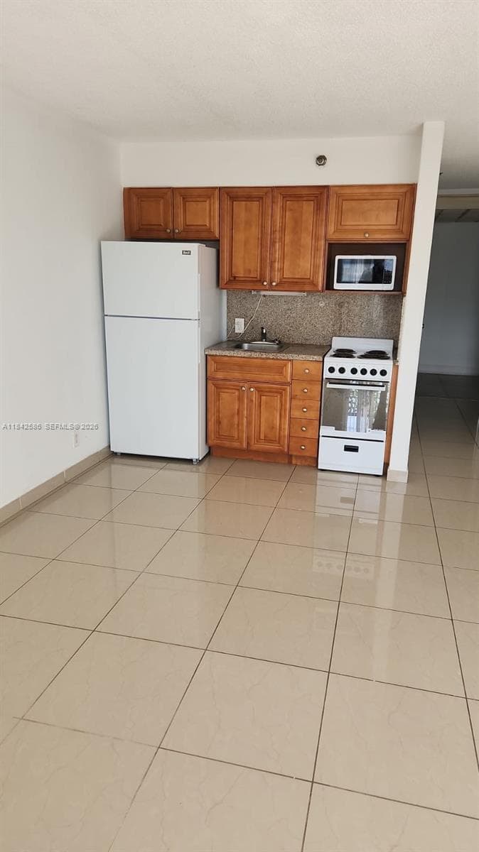16450 NW 2nd Ave # 206, Miami FL 33169 — 1