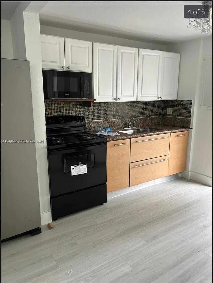2215 NW 33rd St, Miami FL 33142 — 3