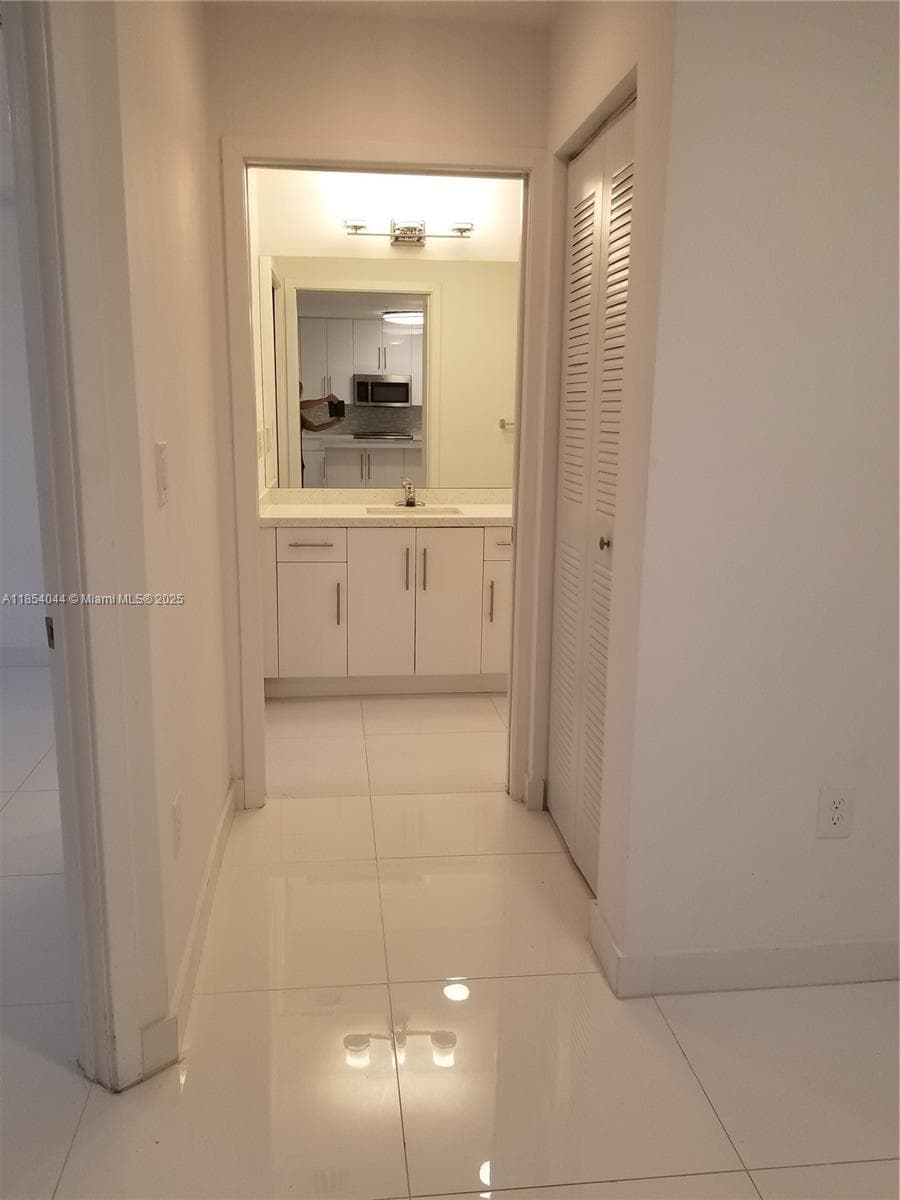 2651 NE 212th Ter # 103, Miami FL 33180 — 23