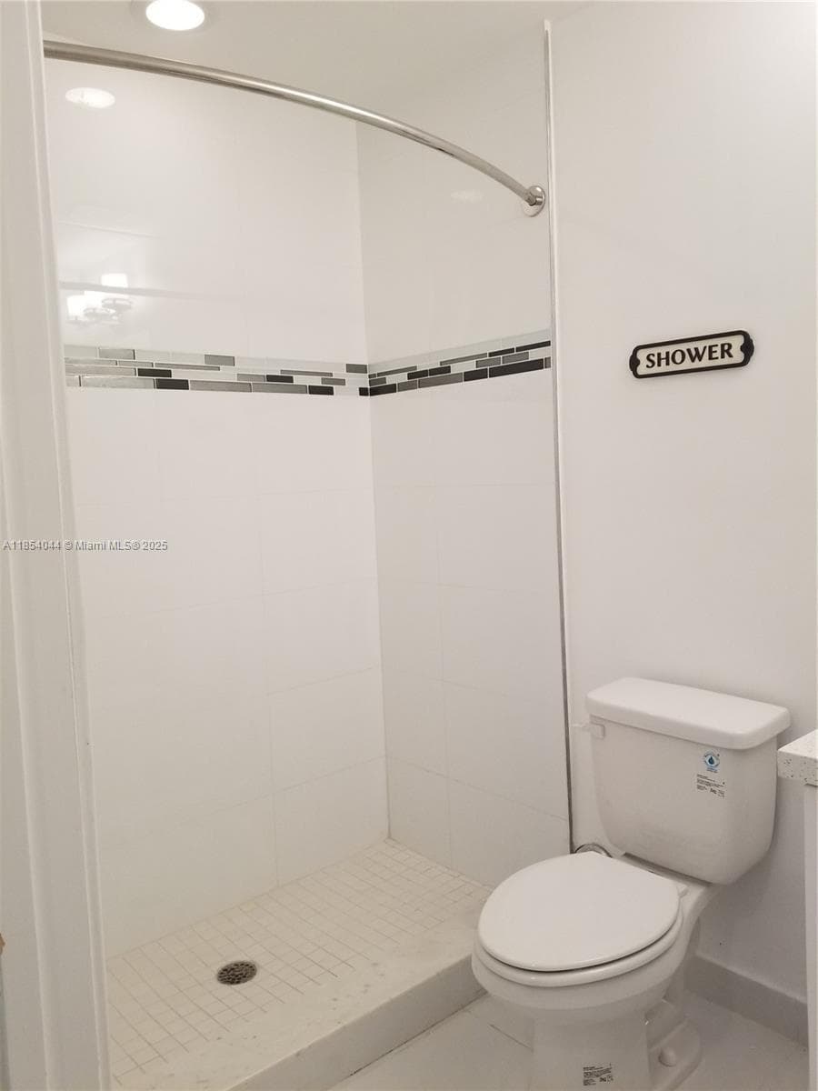 2651 NE 212th Ter # 103, Miami FL 33180 — 26