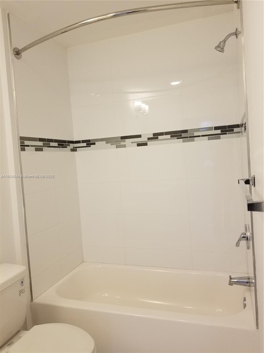 2651 NE 212th Ter # 103, Miami FL 33180 — 32