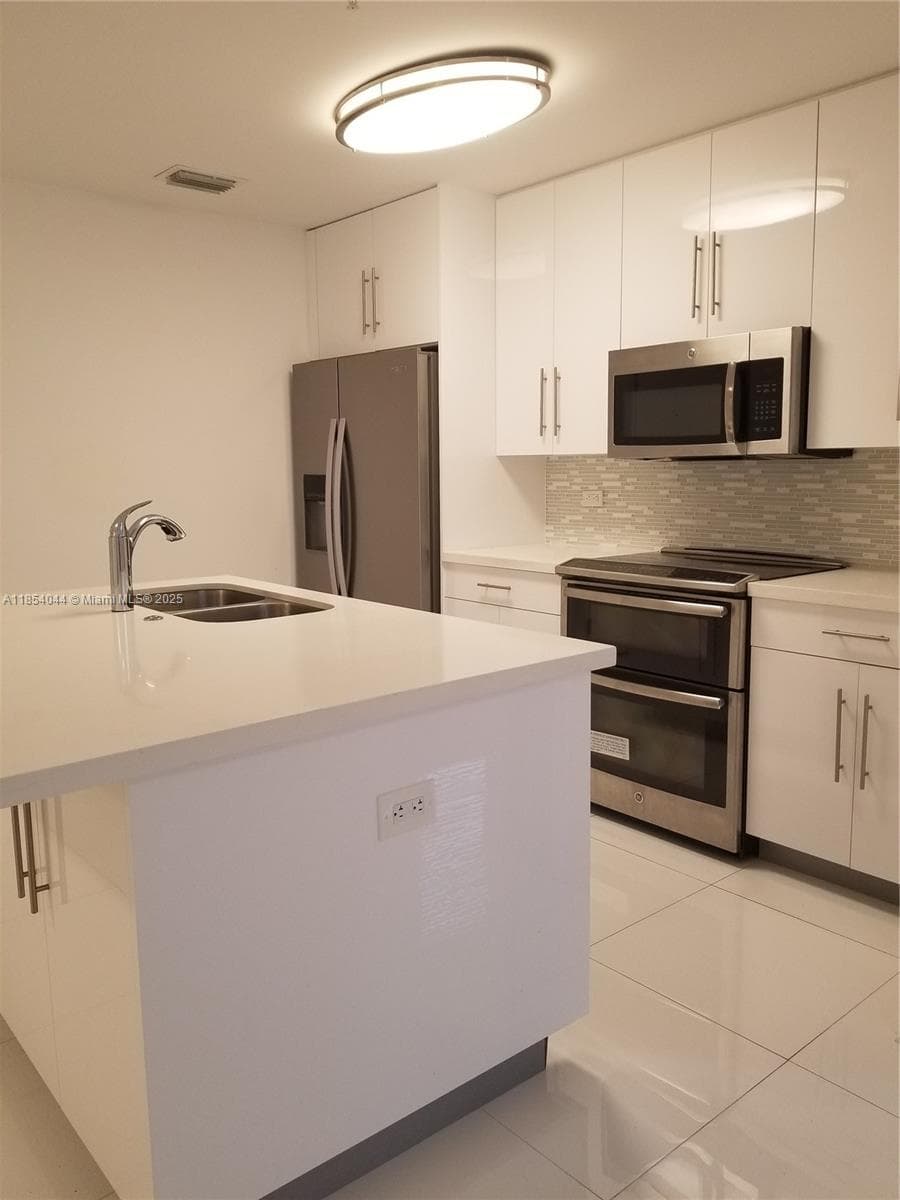 2651 NE 212th Ter # 103, Miami FL 33180 — 1