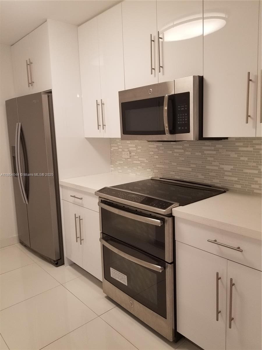 2651 NE 212th Ter # 103, Miami FL 33180 — 4