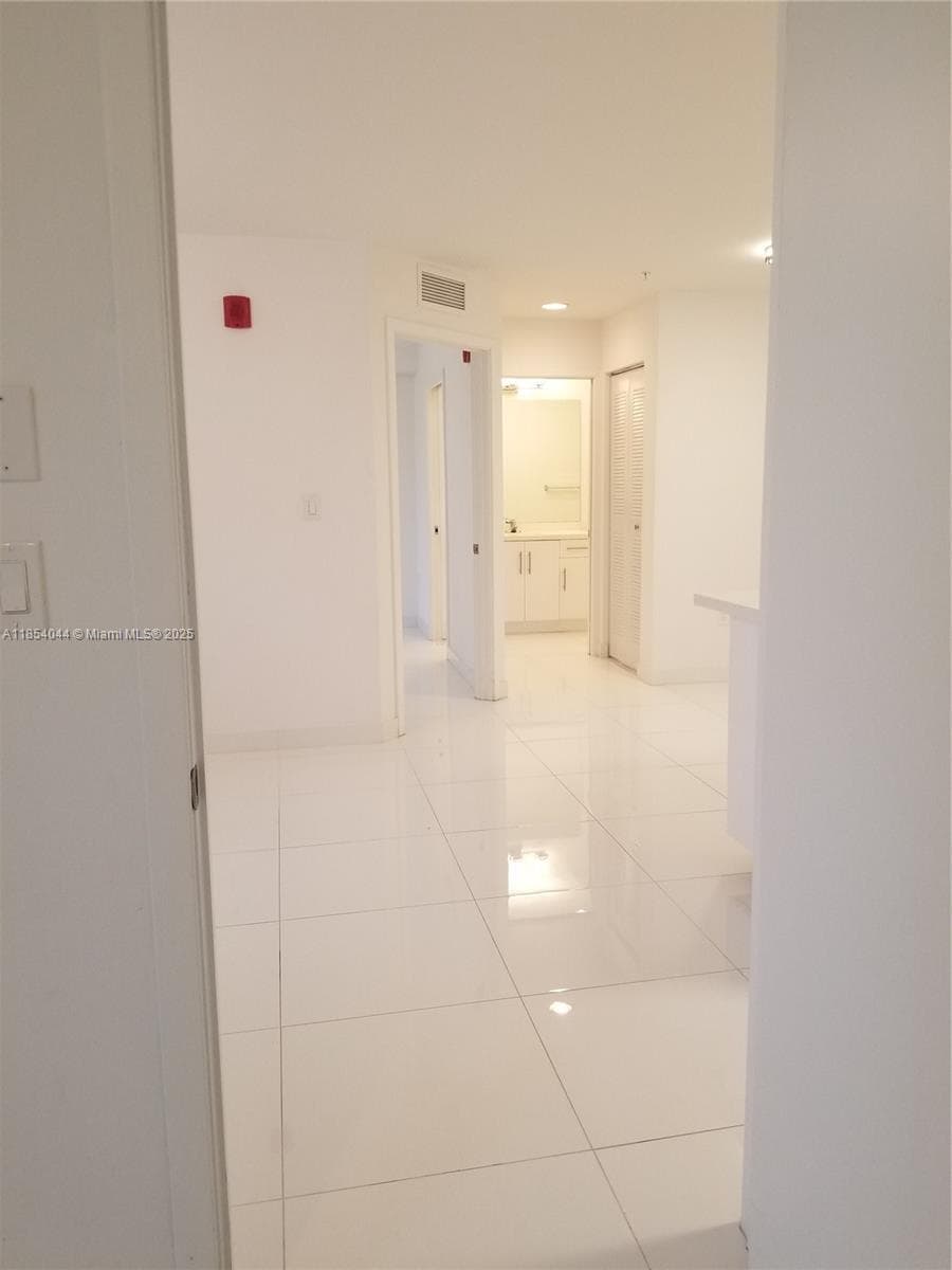 2651 NE 212th Ter # 103, Miami FL 33180 — 21