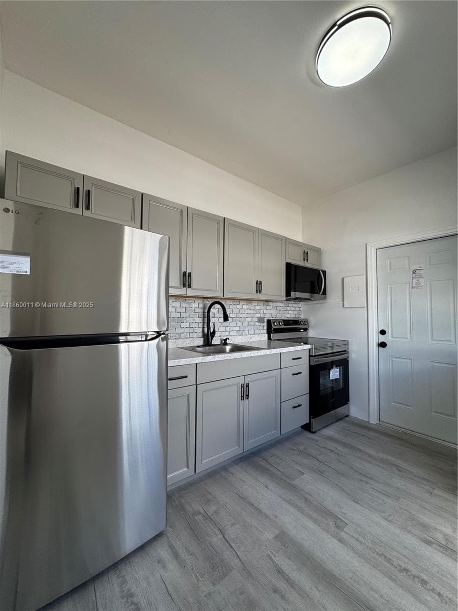 568 E 49th St, Hialeah FL 33013 — 7