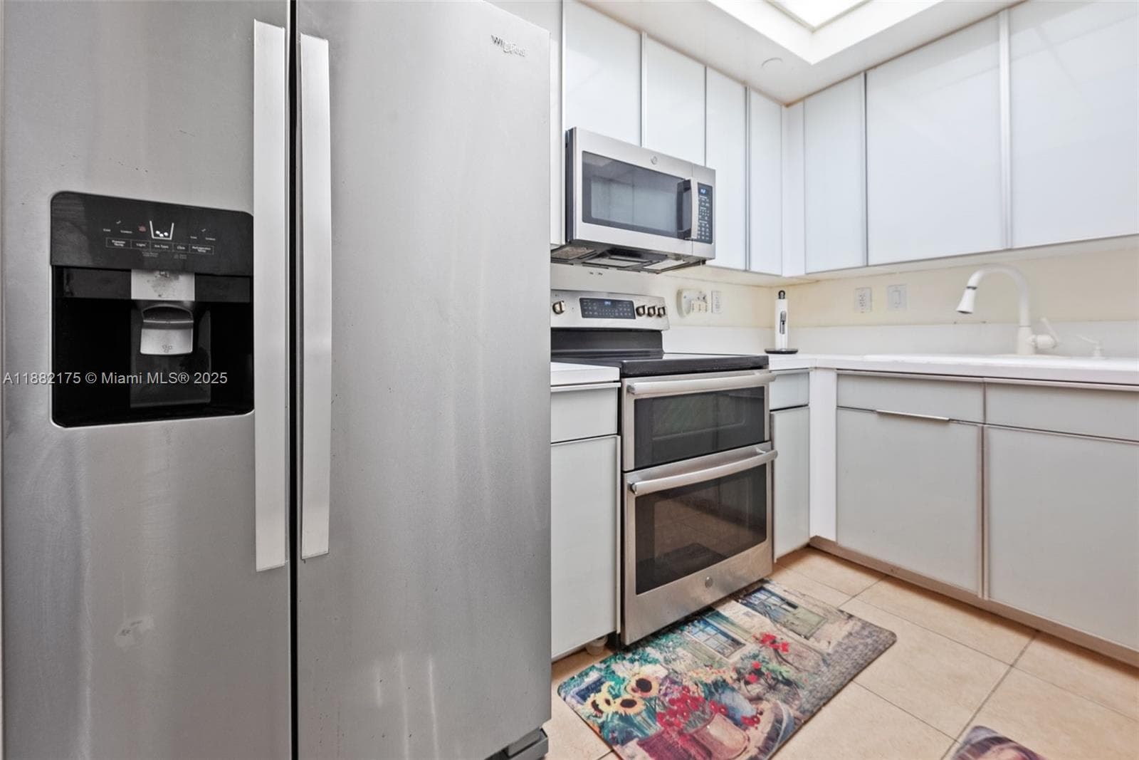 9805 NW 52nd St # 216, Doral FL 33178 — 11