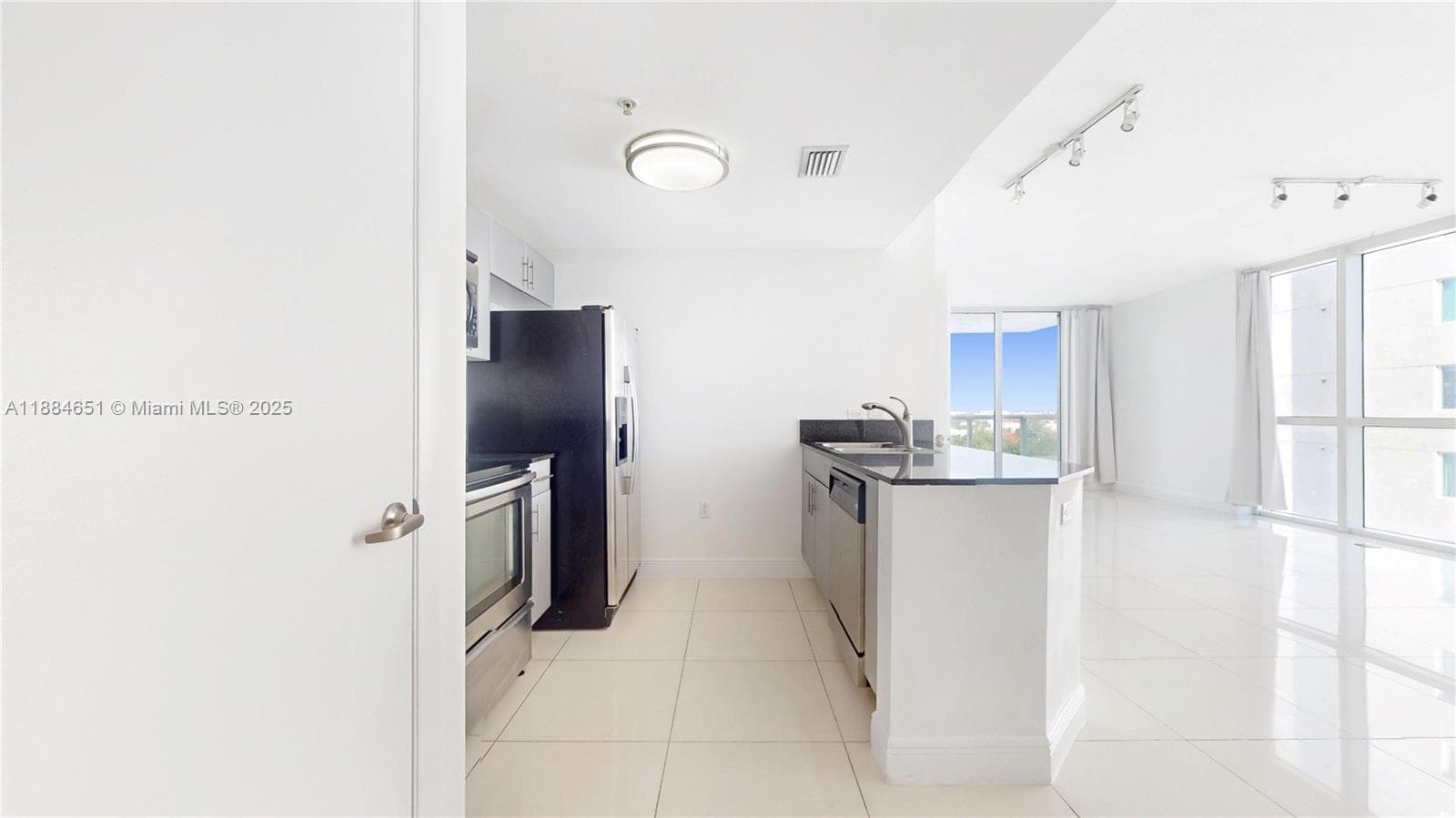1871 NW S River Dr # 1205, Miami FL 33125 — 5