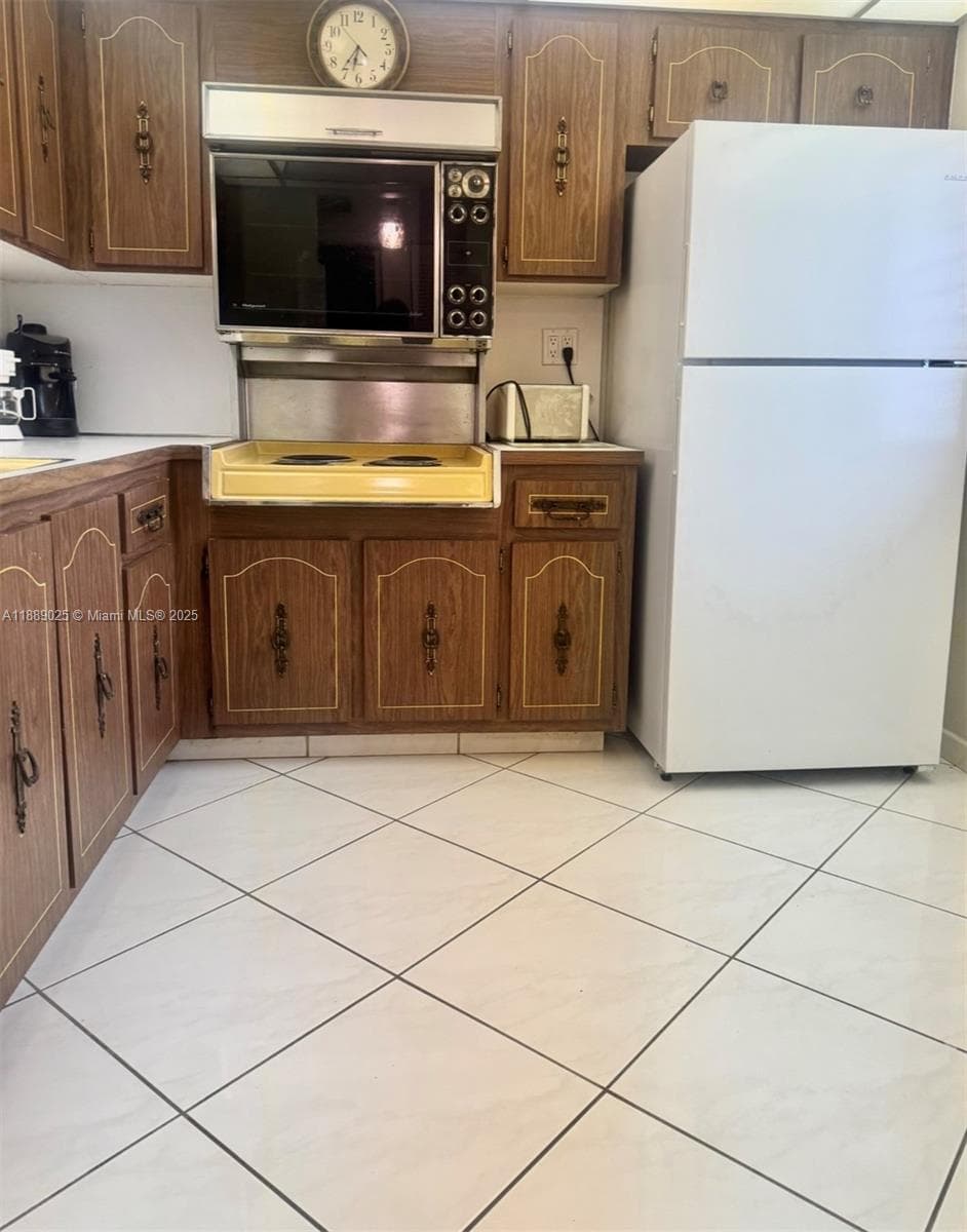 3600 NE 170 St., North Miami Beach FL 33160 — 12