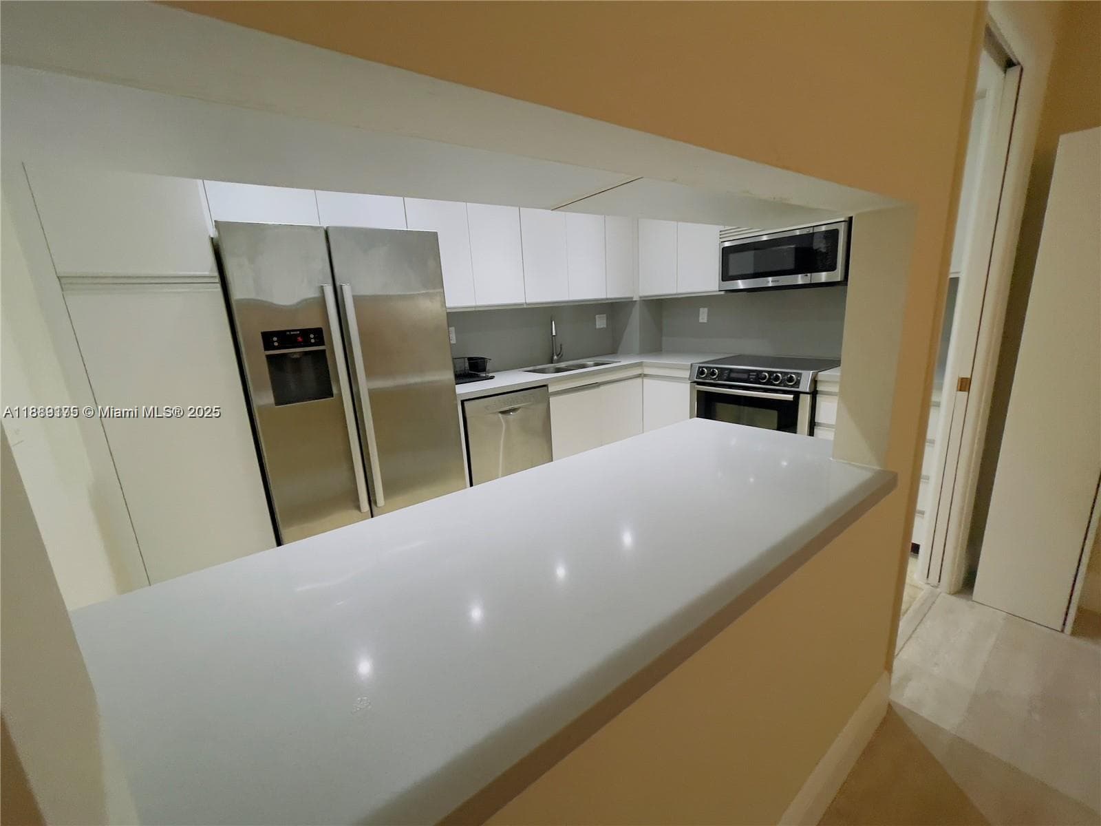 2000 Towerside # 309, Miami FL 33138 — 5
