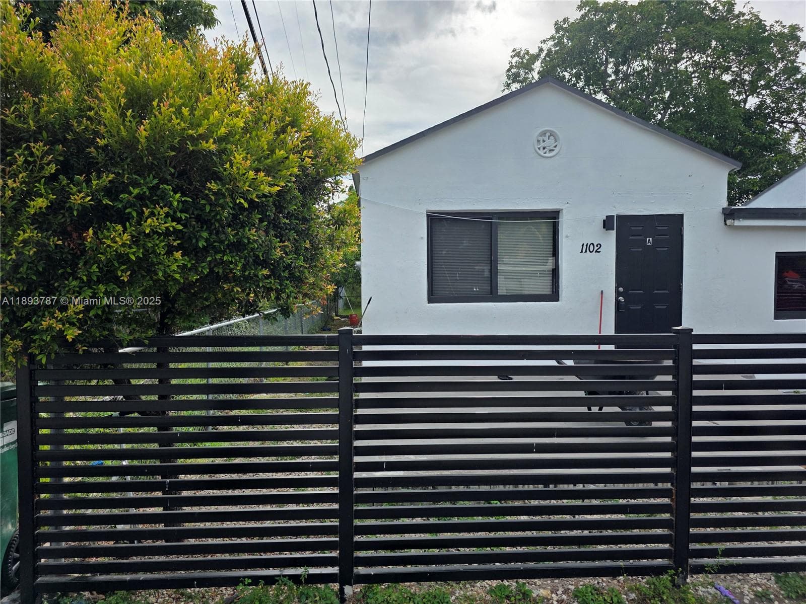 1102 NW 103rd Street, Miami FL 33150 — 33