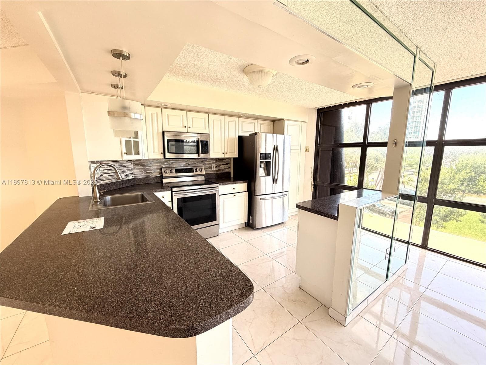 6423 Collins Ave # 310, Miami Beach FL 33141 — 7
