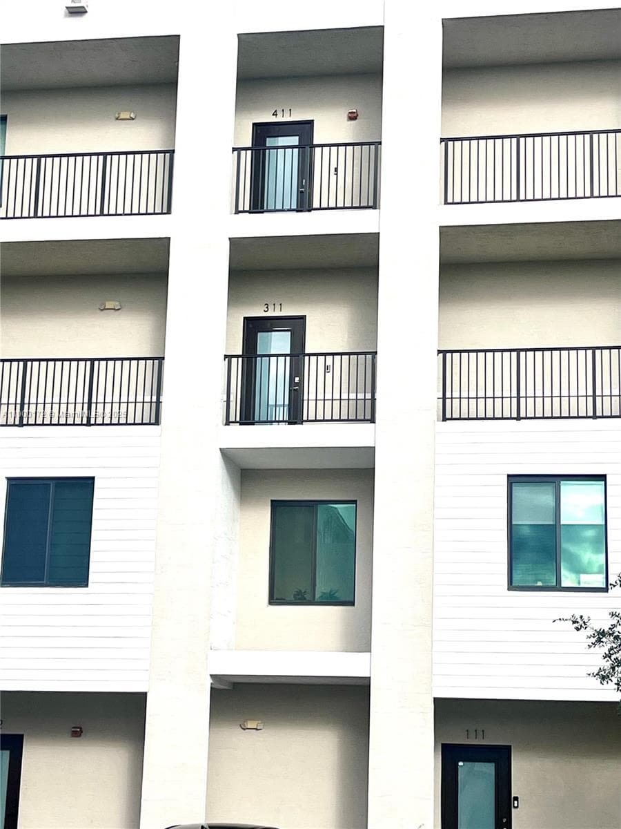 8001 NW 41 ST. # 311, Doral FL 33166 — 3