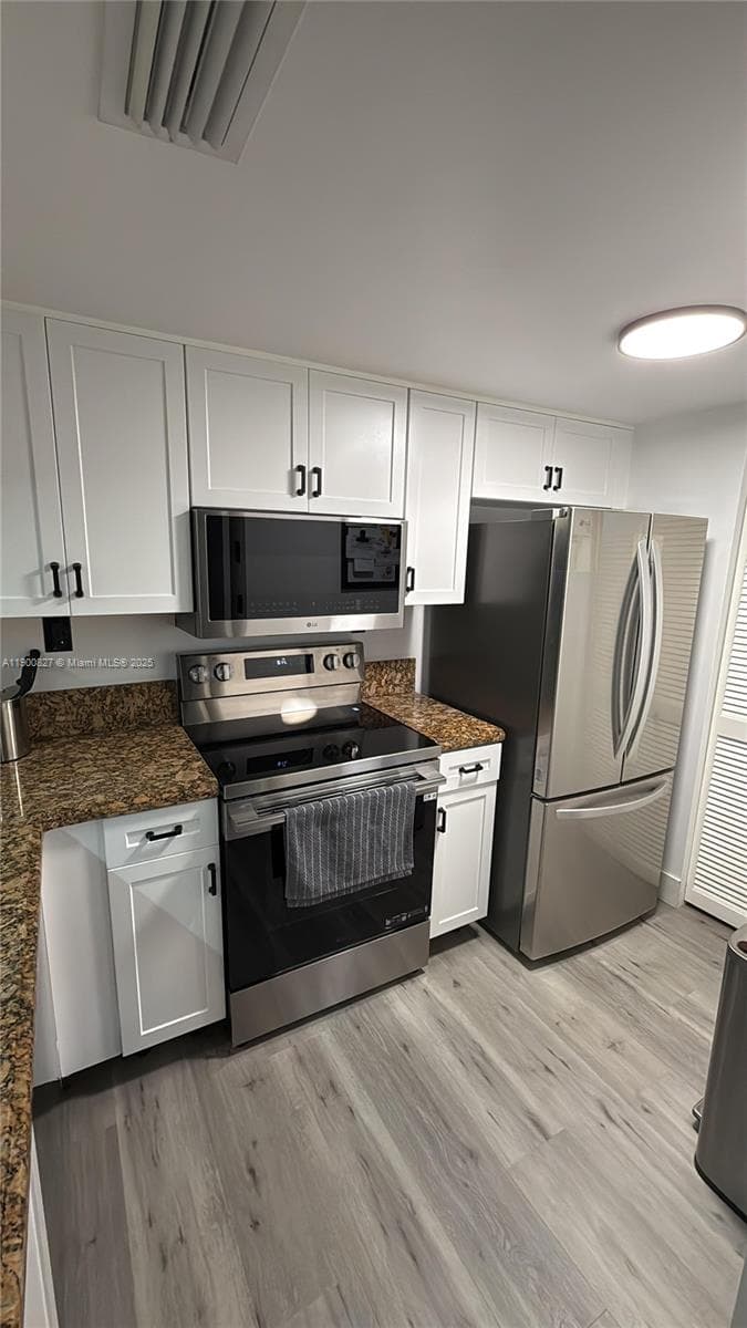 650 West Ave # 303, Miami Beach FL 33139 — 1