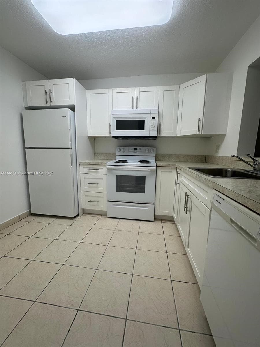 18101 NW 68th Ave # E210, Hialeah FL 33015 — 4