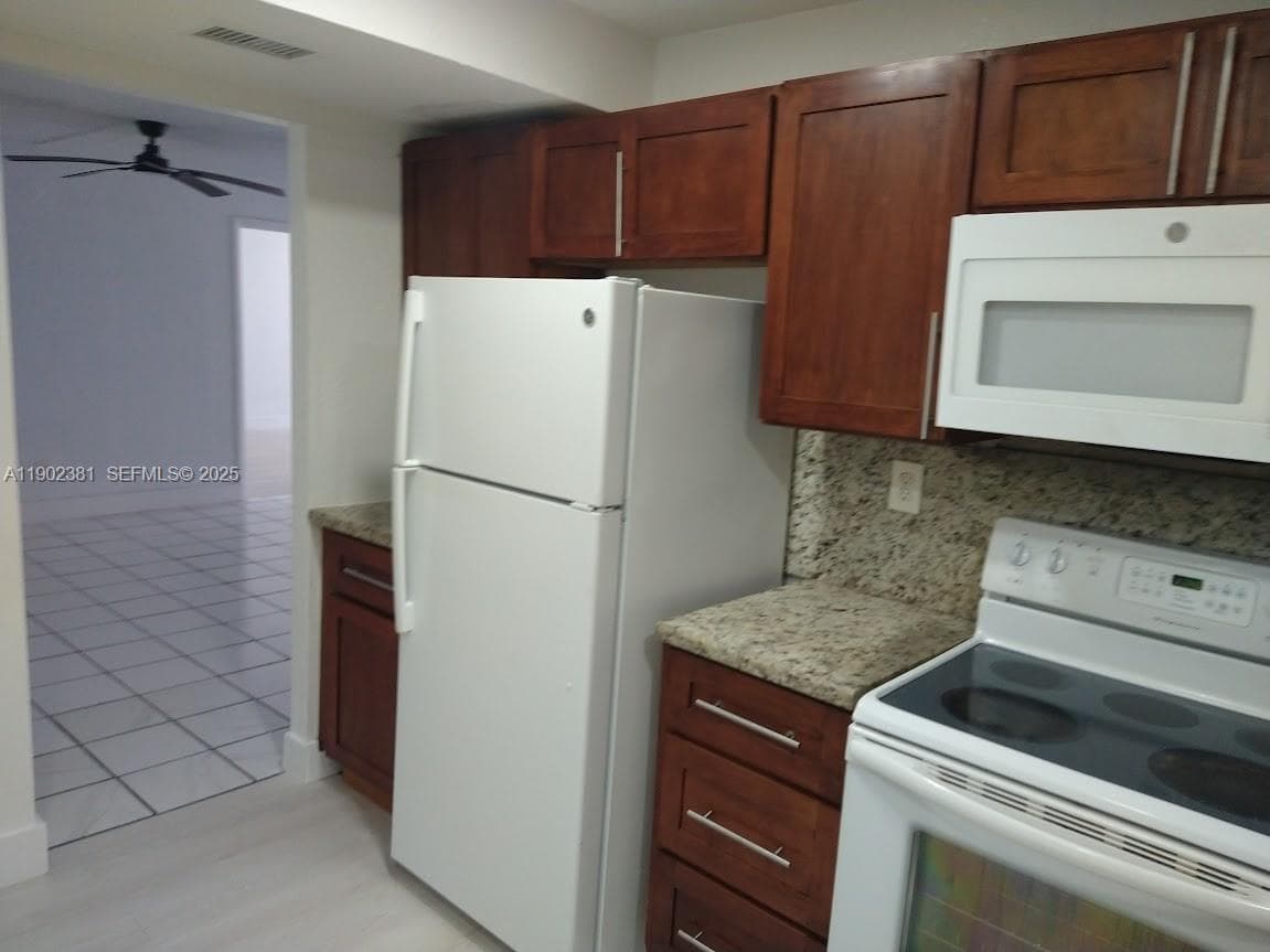 700 NW 214th St # 403, Miami Gardens FL 33169 — 3